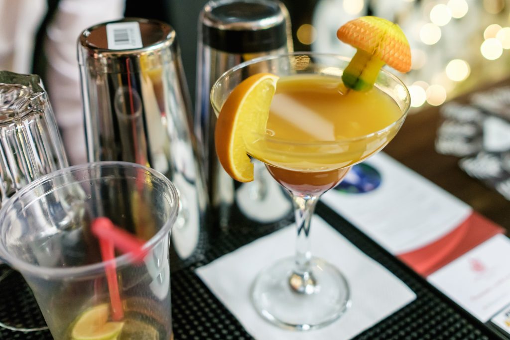 Fresh cocktail with orange and ice.