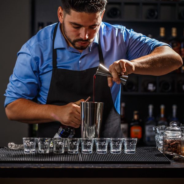 Bartender with jigger
